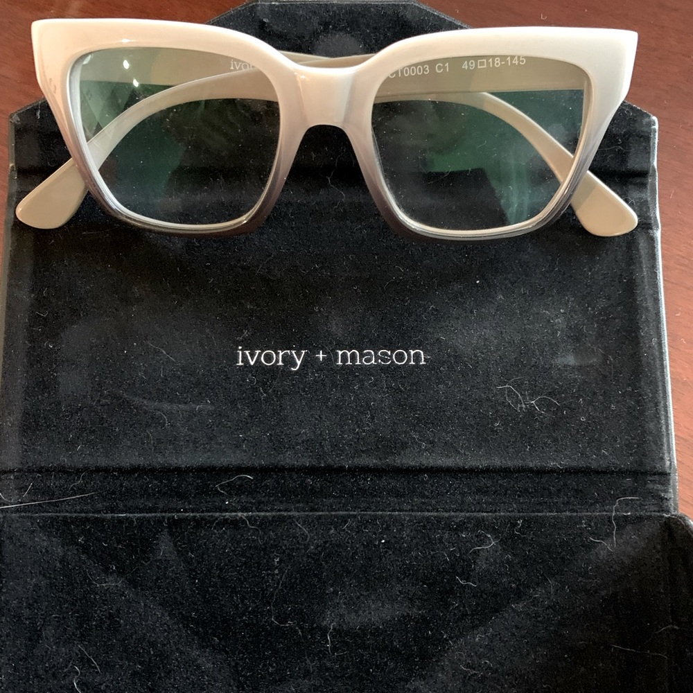 AUTHENTIC Ivory and Mason eyeglasses frame. They are authentic so stop reporting